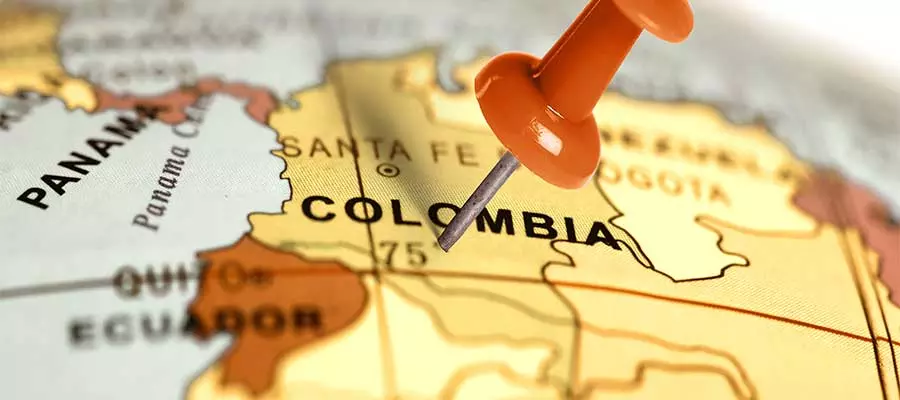 Mapa con un señalador apuntando a Colombia